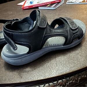 Women’s black Clark sandals